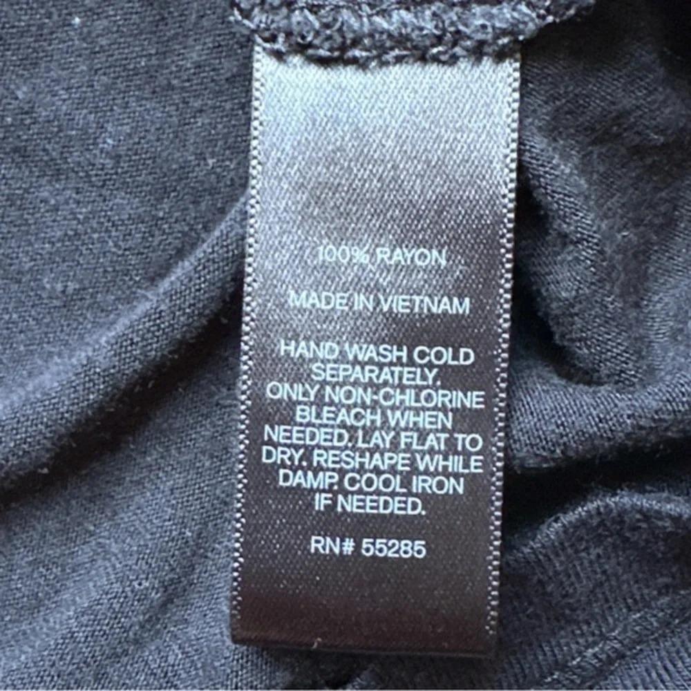 Express size medium, blacking sleeve super soft top, cut out back scoop hangs